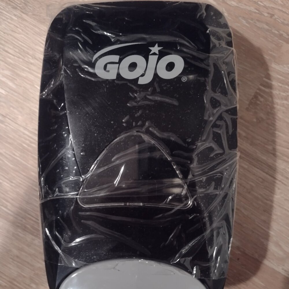 New Gojo hand pump soap dispenser black